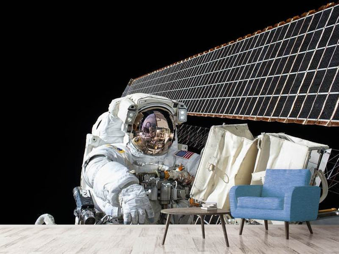 Fotobehang Astronaut aan het werk