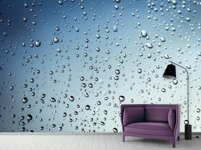 Fotobehang Een muur van regendruppels