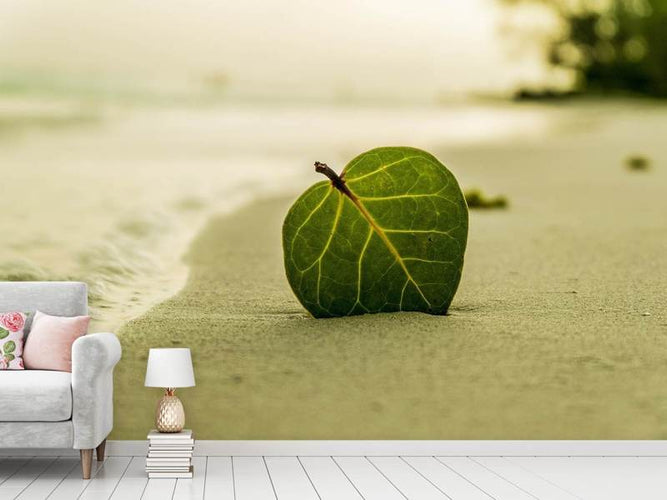 Fotobehang Blad op het strand